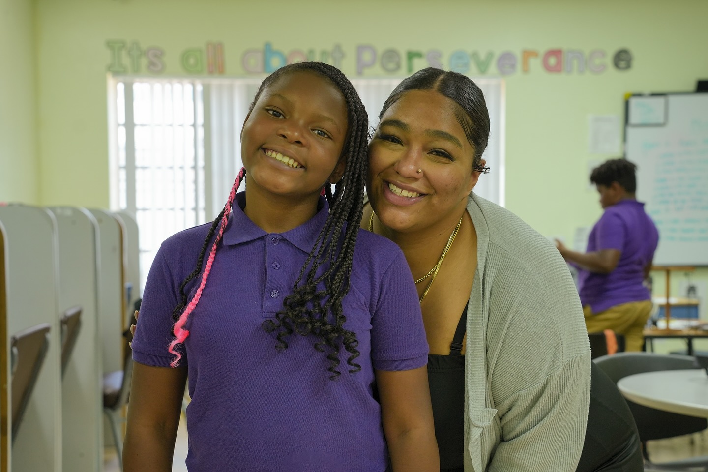 Student smiling with her mentor